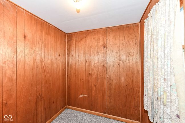 Medium sized room connected to primary bedroom (former entrance) would make a great walk-in closet or master bath on suite | Image 13