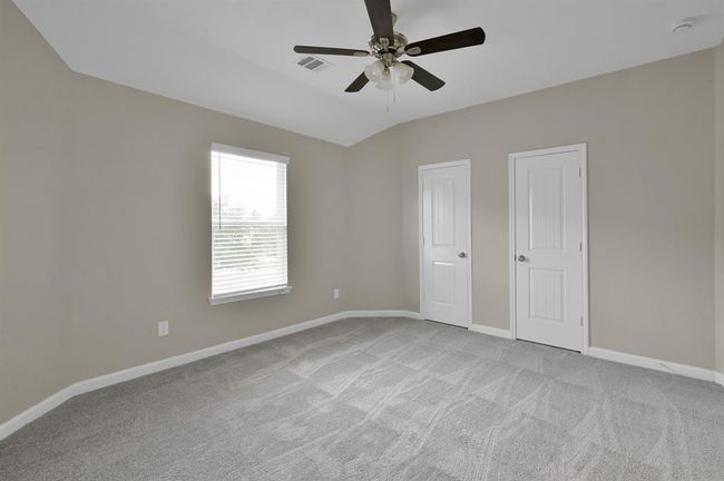Bedroom 5 with ceiling fan. | Image 35