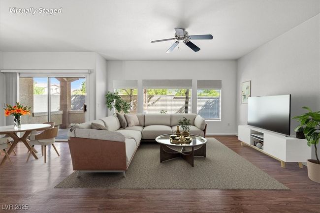 Resort-Style First Floor Living in Prime Summerlin South! Located in a highly sought-after gated Garden Terrace community, complete with a spacious 2-car tandem garage. Step inside to an expansive open-concept living space filled with warm natural light and designer touches throughout. Featuring a brand-new air conditioning system and a recently upgraded water heater, this turnkey residence is move-in ready and designed for effortless living. | Image 5