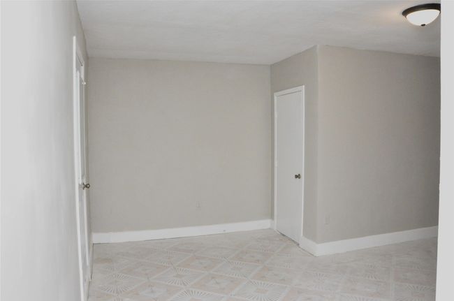 Bonus room with baseboards | Image 25