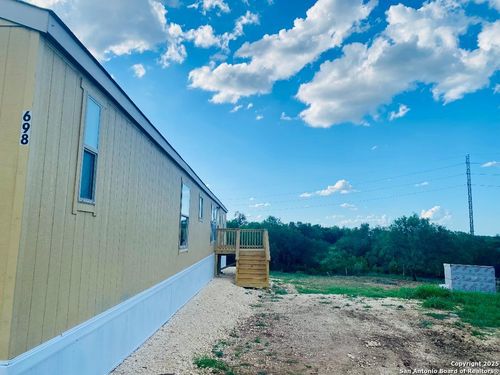 698 Forest Creek Rd, Devine, TX, 78016-2237 | Card Image