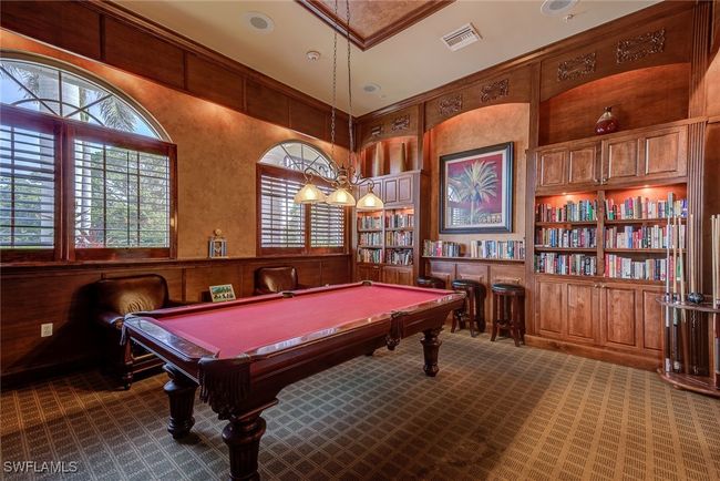 Game room featuring dark carpet, pool table, built in features, and visible vents | Image 33