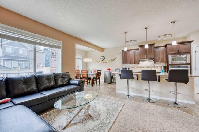 1151 Kings Heights Way Se, Home with 3 bedrooms, 3 bathrooms and 4 parking in Airdrie AB | Image 2