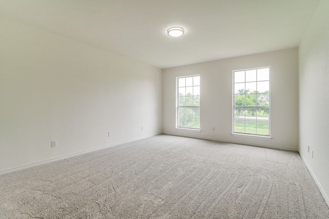 Carpeted spare room featuring baseboards | Image 22