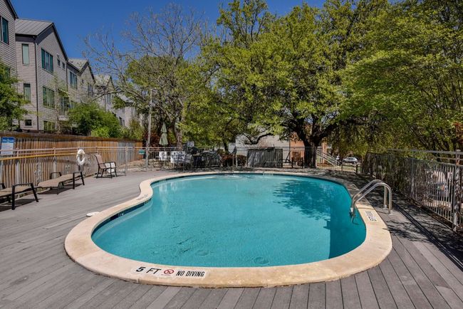 Community pool featuring a deck | Image 30