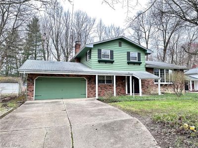 View of front facade with a front yard | Image 2