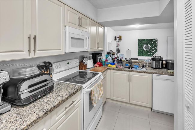 APT-104 - 18810 Nw 57 Th Ave, Condo with 2 bedrooms, 2 bathrooms and null parking in Hialeah FL | Image 14