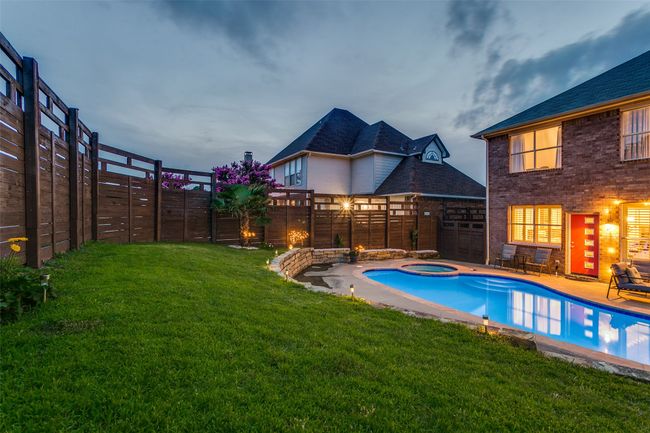View of pool featuring an in-ground hot tub | Image 28