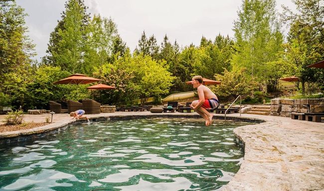 The 250' water slide is the centerpiece of our family-friendly water park and pool area | Image 41