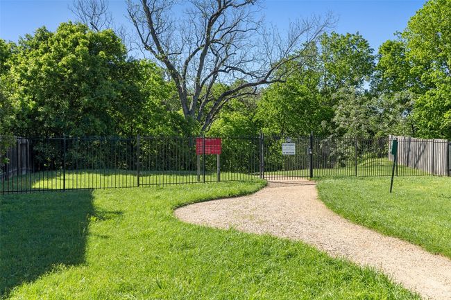 Knollwood on the Colorado River has 251 homes less than 5 miles East of downtown Austin. Amenities include 3 mailbox clusters shaded by trellises, 2 park lots: corners of Lane City Drive/Bay City Bend and Alleyton Drive/Spanish Camp Cove, a 12 Acre HOA private riverfront park on the Colorado River offering a mowed trail, picnic area with: tables, Adirondack chairs, kids tree swings, canoe & kayak launch. Plus you can take the Walnut Creek hike and bike path to Govalle Park & downtown Austin to the West or The YMCA & the Austin Tennis Center to the North. The entrance to the hike and bike path is on Delwau Lane just past the bridge over Boggy Creek. The annual HOA fee is only $275 per year which takes care of the common areas of the community. | Image 36