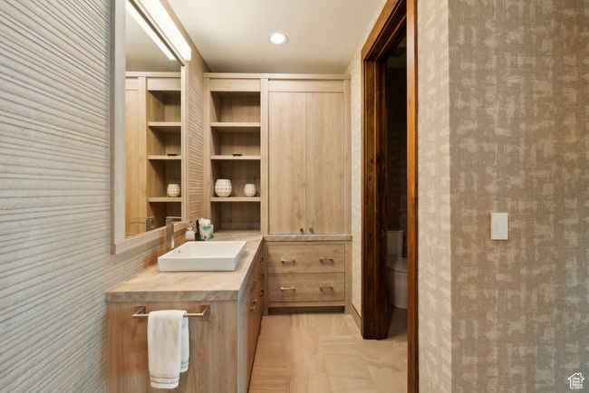 Bathroom with vanity and toilet | Image 78