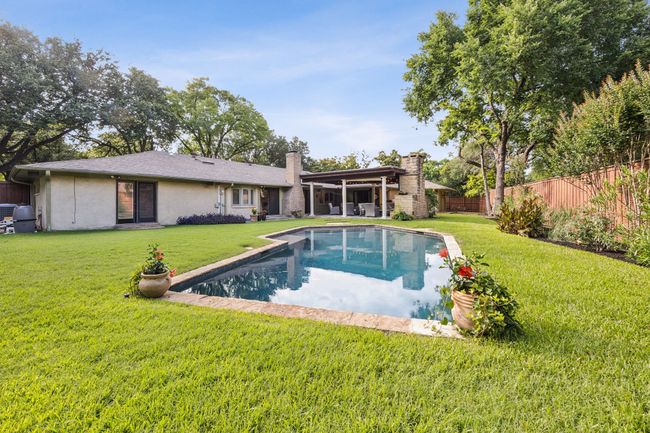 Refreshing pool in spacious yard. | Image 8