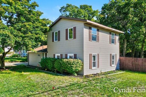 105 6 Mile Rd, Comstock Park, MI, 49321-8916 | Card Image