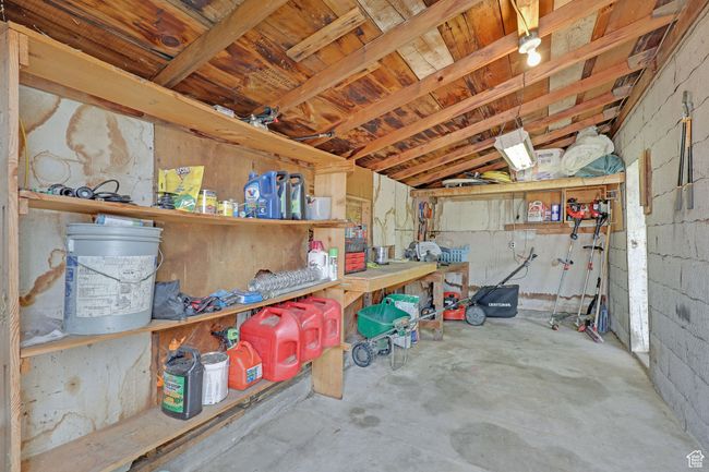 Garage featuring a workshop area | Image 35