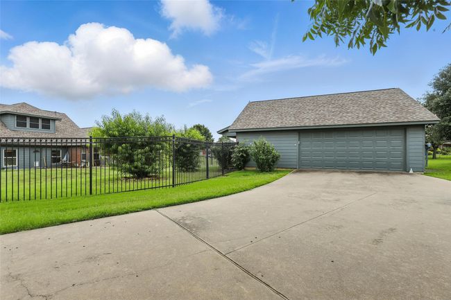 View of detached garage | Image 6