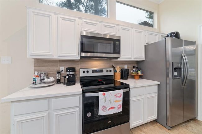 36 N Rain Forest Ct, House other with 4 bedrooms, 2 bathrooms and 2 parking in Spring TX | Image 13