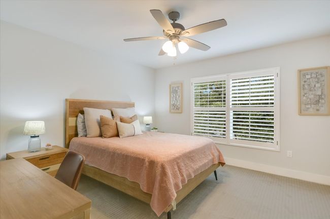Guest bedroom featuring a large closet and great natural lighting | Image 16