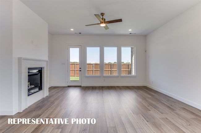 Your spacious light filled family room is large enough to host the entire family! REPRESENTATIVE PHOTO | Image 10