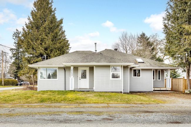 Ranch-style home featuring a front yard, fence, and roof with shingles | Image 16