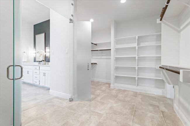 View of spacious closet | Image 27