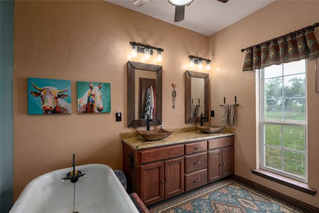 Primary bath with ensuite, dual sinks, clawfoot tub and separate shower | Image 33
