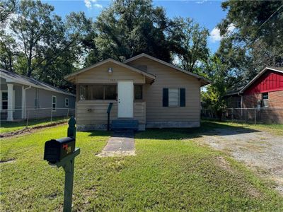 Bungalow featuring a front yard | Image 2