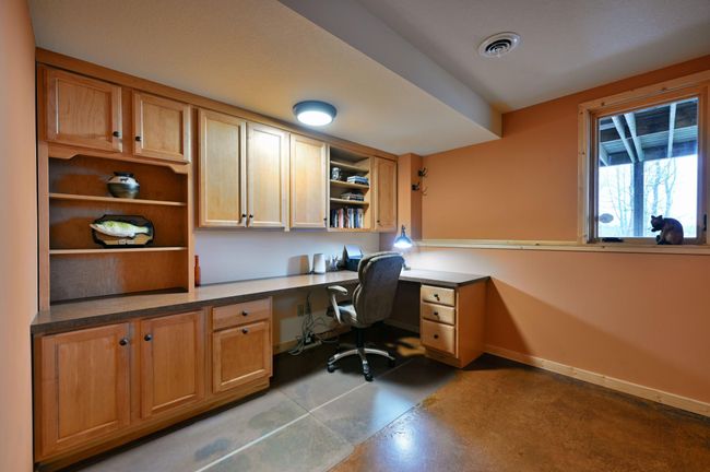 There an additional office space on this level with built-ins. There is a walk-in closet in the hall that could be paired with this room if you wanted to use it as an additional bedroom. | Image 46