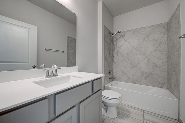 Full bath with toilet, vanity, and tub / shower combination | Image 6