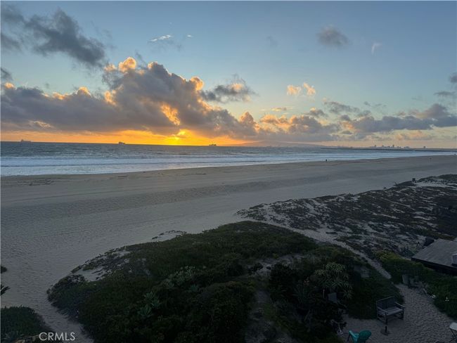 moment of calm as the sun slowly sets over the Pacific, painting the sky in brilliant hues. | Image 57