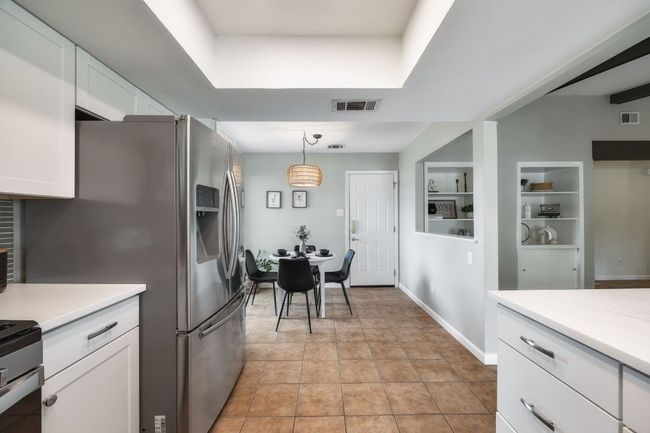 Kitchen to dining and garage | Image 12