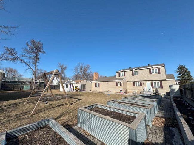 Back yard with raised planters | Image 41