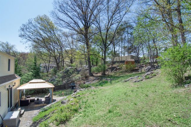 View of yard featuring a gazebo, a patio area, and outdoor lounge area | Image 22