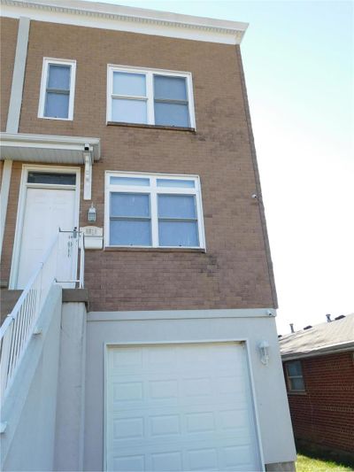 View of front of home featuring a garage | Image 1