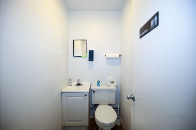 Bathroom with toilet and vanity | Image 30