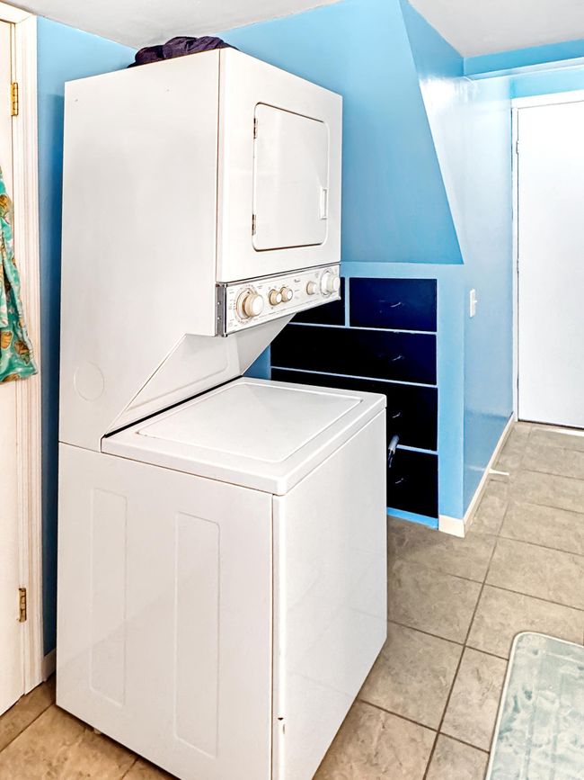 Stackable laundry on main, with extra laundry in the basement! | Image 15