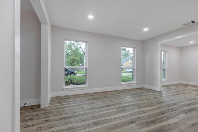 Expansive family room can be used as home office /study or downstairs game room. | Image 25