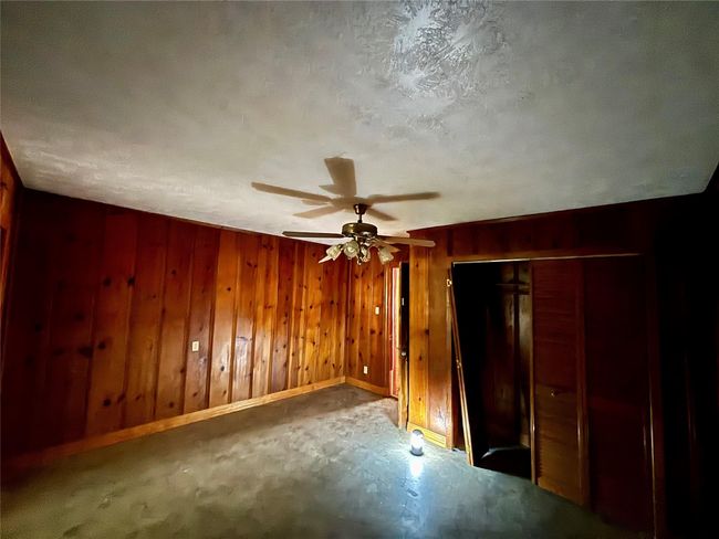 3rd bedroom downstairs entrance to garage | Image 19