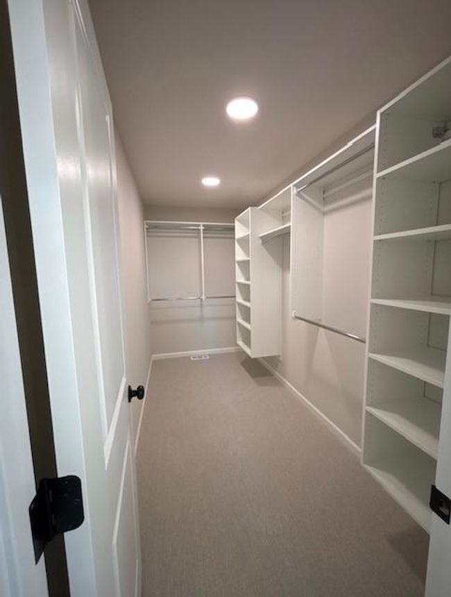 Large Primary Closet with shelving included! | Image 17