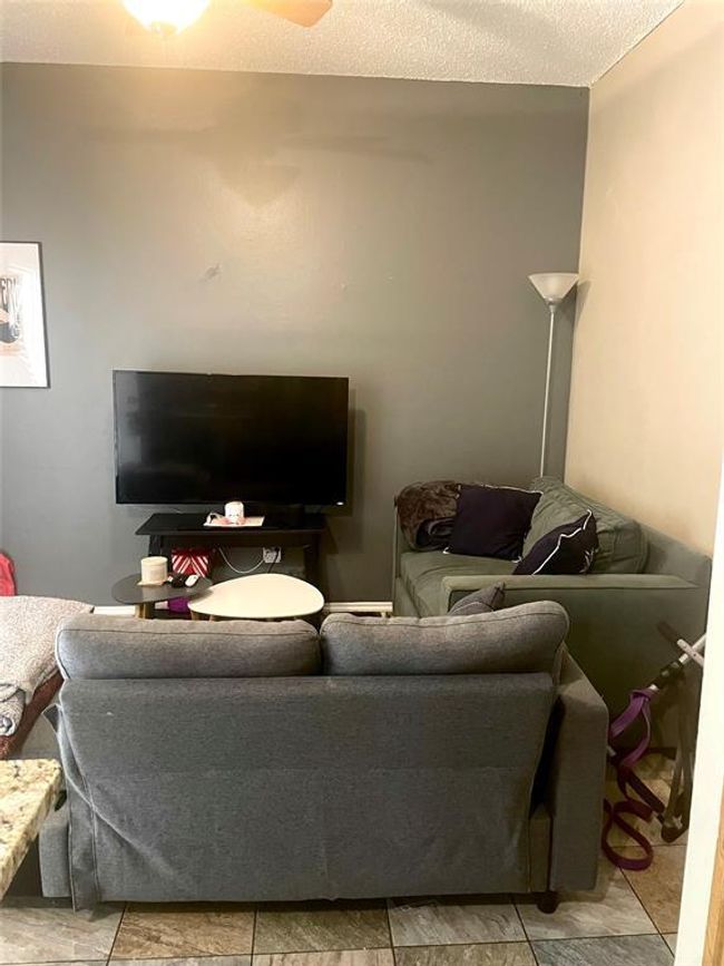 View of living room | Image 17