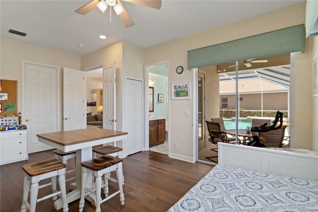 Bedroom 4 ensuite bath and private lanai to pool. | Image 19