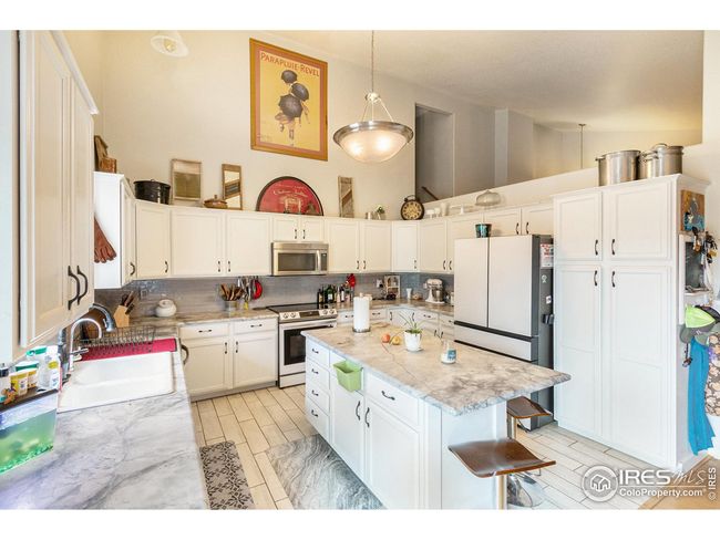 3328 Wild West Ln, House other with 4 bedrooms, 4 bathrooms and null parking in Wellington CO | Image 13