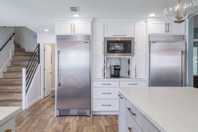 Full sized Frigidaire fridge and freezer, separated by garage appliance. | Image 10