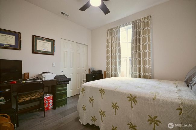 Lower bedroom with closet. | Image 22