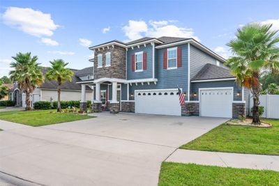 84165 Swallowtail Drive, Home with 5 bedrooms, 3 bathrooms and null parking in Yulee FL | Image 2