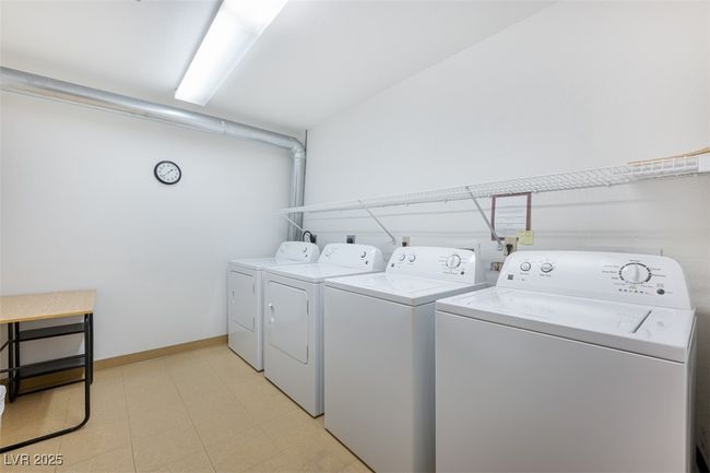 Common Laundry area featuring separate washer and dryer and laundry area | Image 56