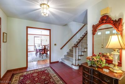 Entrance foyer featuring an inviting chandelier and wood-type flooring | Image 2