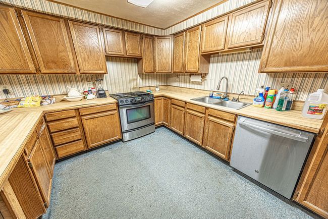 Kitchen with stainless steel appliances and sink | Image 45