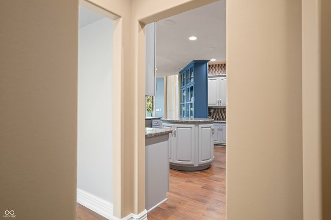hallway with wood finished floors and recessed lighting | Image 36
