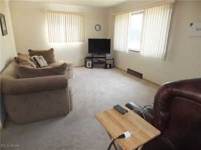 Living room featuring carpet floors | Image 2