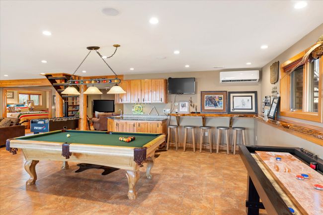 Lower level family area, entertaining, game, living room. | Image 69